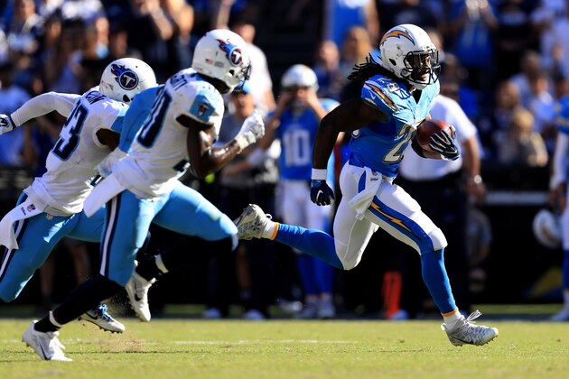SAN DIEGO, CA - NOVEMBER 06:  Wesley Woodyard #59 of the Tennessee Titans chases   Melvin Gordon #28 as Antonio Gates #85 of the San Diego Chargers blocks during the second half of a game at Qualcomm Stadium on November 6, 2016 in San Diego, California.  (Photo by Sean M. Haffey/Getty Images)