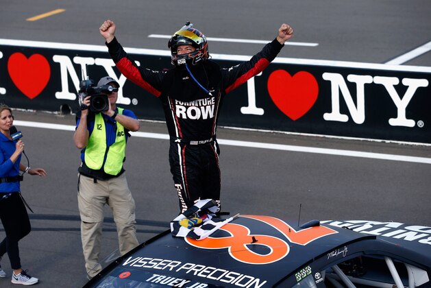 WATKINS GLEN, NY - AUGUST 06:  Martin Truex Jr., driver of the #78 Furniture Row/Denver Mattress Toyota, celebrates after winning the Monster Energy NASCAR Cup Series I Love NY 355 at The Glen at Watkins Glen International on August 6, 2017 in Watkins Glen, New York.  (Photo by Jeff Zelevansky/Getty Images)