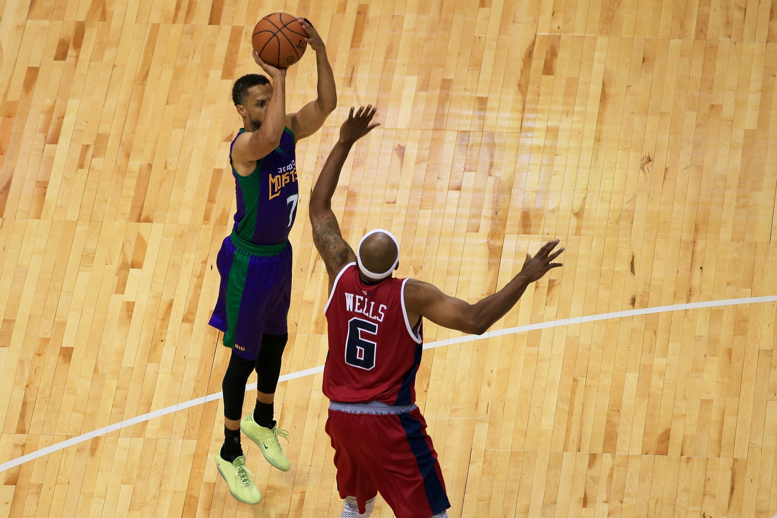 DALLAS, TX - JULY 30: Mahmoud Abdul-Rauf #7 of the 3 Headed Monsters attempts a shot over Bonzi Wells #6 of Tri-State during week six of the BIG3 three on three basketball league at American Airlines Center on July 30, 2017 in Dallas, Texas. (Photo by Ron Jenkins/BIG3/Getty Images) DALLAS, TX - JULY 30: Mahmoud Abdul-Rauf #7 of the 3 Headed Monsters attempts a shot over Bonzi Wells #6 of Tri-State during week six of the BIG3 three on three basketball league at American Airlines Center on July 30, 2017 in Dallas, Texas. (Photo by Ron Jenkins/BIG3/Getty Images)