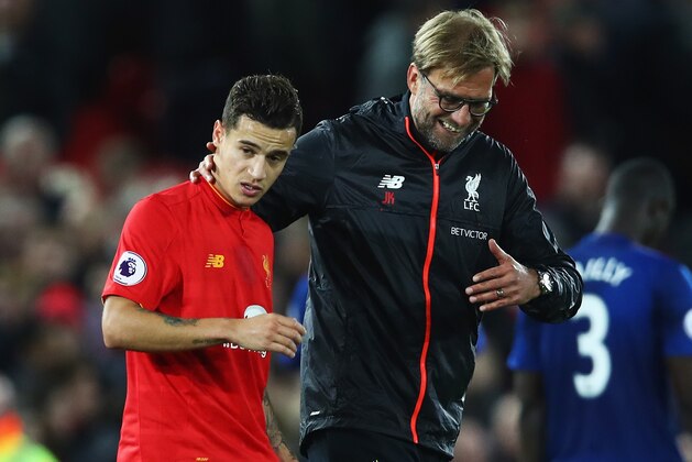 LIVERPOOL, ENGLAND - OCTOBER 17:  Jurgen Klopp, Manager of Liverpool talks with Philippe Coutinho of Liverpool after the Premier League match between Liverpool and Manchester United at Anfield on October 17, 2016 in Liverpool, England.  (Photo by Clive Brunskill/Getty Images)
