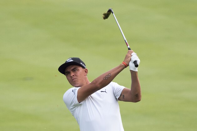 August 4, 2017; Akron, OH, USA; Rickie Fowler hits his fairway shot on the 10th hole during the second round of the WGC - Bridgestone Invitational golf tournament at Firestone Country Club - South Course. Mandatory Credit: Kyle Terada-USA TODAY Sports