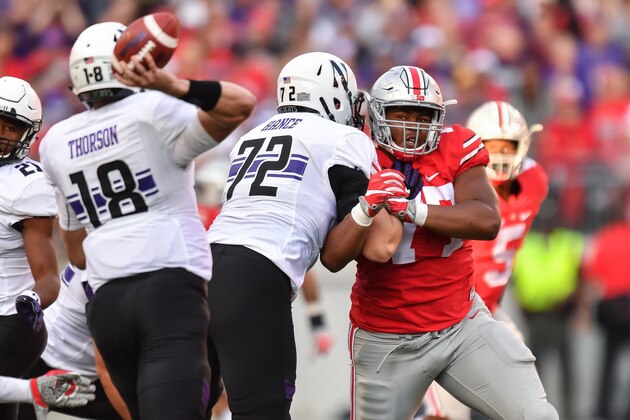 COLUMBUS, OH - OCTOBER 29:  Michael Hill #77 of the Ohio State Buckeyes chases after the ballcarrier against the Northwestern Wildcats at Ohio Stadium on October 29, 2016 in Columbus, Ohio.  (Photo by Jamie Sabau/Getty Images)