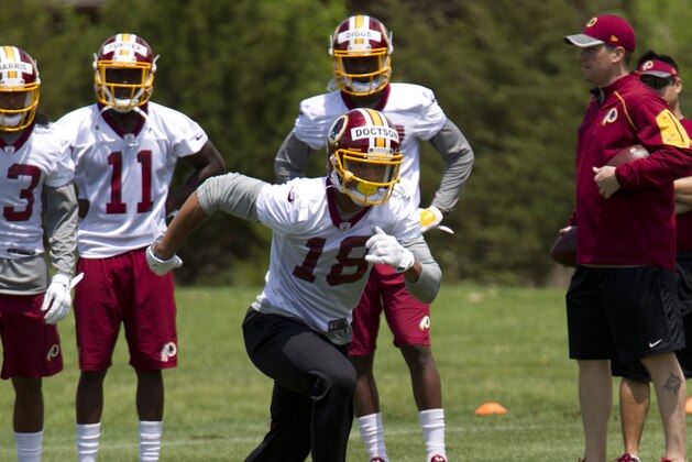 In this photo taken May 14, 2016, Washington Redskins wide receiver Josh Doctson, 18, works out during NFL football rookie minicamp, in Ashburn, Va. The Washington Redskins are putting first-round draft pick Josh Doctson on injured reserve with an injured left Achilles tendon.  (AP Photo/Jose Luis Magana)