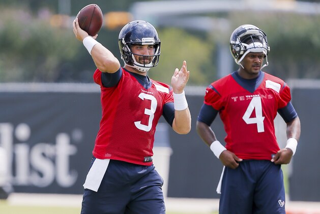 Houston Texans quarterback Tom Savage (3) throws a pass as quarterback Deshaun Watson (4) looks on during the team's organized team activity at its NFL football training facility Wednesday, May 31, 2017, in Houston. (AP Photo/Bob Levey) Houston Texans quarterback Tom Savage (3) throws a pass as quarterback Deshaun Watson (4) looks on during the team's organized team activity at its NFL football training facility Wednesday, May 31, 2017, in Houston. (AP Photo/Bob Levey)
