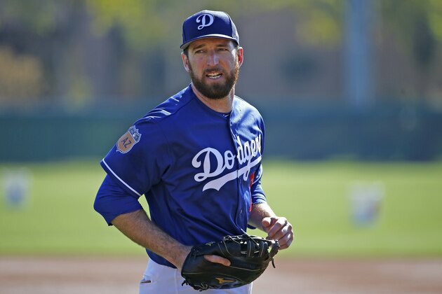 Los Angeles Dodgers' Ike Davis pauses during infield drills at the team's baseball spring training facility Tuesday, Feb. 21, 2017, in Glendale, Ariz. (AP Photo/Ross D. Franklin)