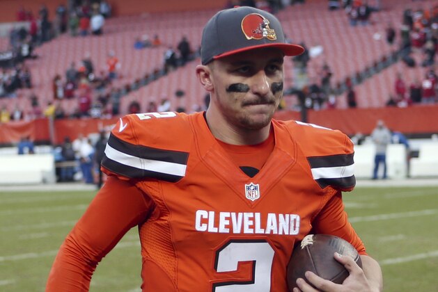 Cleveland Browns quarterback Johnny Manziel runs to the locker room after his team defeated the 49ers 24-10 in an NFL football game, Sunday, Dec. 13, 2015, in Cleveland. (AP Photo/Ron Schwane)