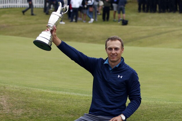 FILE - In this July 23, 2017, file photo, Jordan Spieth, of the United States, holds the Claret Jug trophy after winning the British Open Golf Championships at Royal Birkdale, Southport, England. Spieth understands perfectly what is at stake in the final major championship of the year, the PGA Championship. A victory would make the 24-year-old Texan only the sixth player, and the youngest by about six months over Tiger Woods, to capture the career Grand Slam. (AP Photo/Dave Thompson, File)