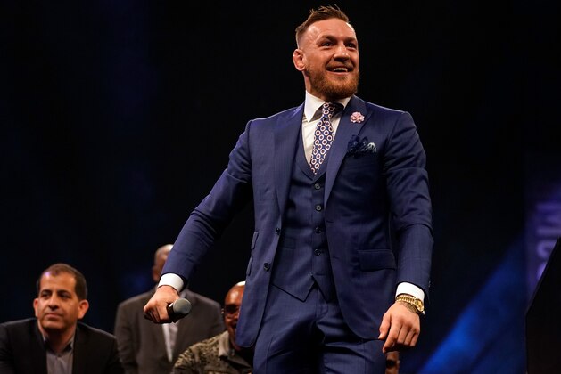 LONDON, ENGLAND - JULY 14:  Conor McGregor reacts to the crowd during the Floyd Mayweather Jr. v Conor McGregor World Press Tour event at SSE Arena on July 14, 2017 in London, England. (Photo by Jeff Bottari/Zuffa LLC/Zuffa LLC via Getty Images)