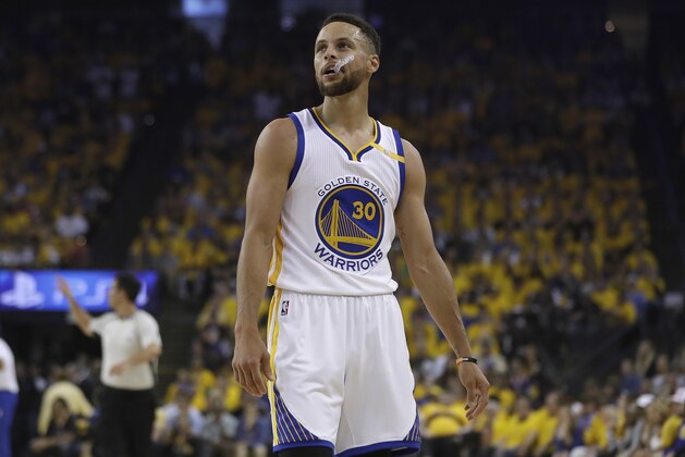Golden State Warriors guard Stephen Curry (30) against the Cleveland Cavaliers during the first half of Game 1 of basketball's NBA Finals in Oakland, Calif., Thursday, June 1, 2017. (AP Photo/Marcio Jose Sanchez)
