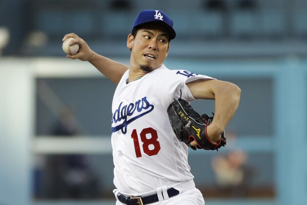 Los Angeles Dodgers starting pitcher Kenta Maeda, of Japan, throws against the Minnesota Twins during the first inning of a baseball game, Tuesday, July 25, 2017, in Los Angeles. (AP Photo/Jae C. Hong)