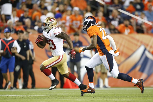 DENVER, CO - AUGUST 20: Kelvin Taylor #23 of the San Francisco 49ers rushes during the game against the Denver Broncos at Sports Authority Field on August 20, 2016 in Denver, Colorado. The 49ers defeated the Broncos 31-24. (Photo by Michael Zagaris/San Francisco 49ers/Getty Images)