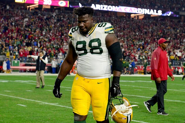 GLENDALE, AZ - JANUARY 16:  Defensive end Letroy Guion #98 of the Green Bay Packers walks off the field after losing in overtime to the Arizona Cardinals 26-20  in the NFC Divisional Playoff Game at University of Phoenix Stadium on January 16, 2016 in Glendale, Arizona.  (Photo by Jennifer Stewart/Getty Images)