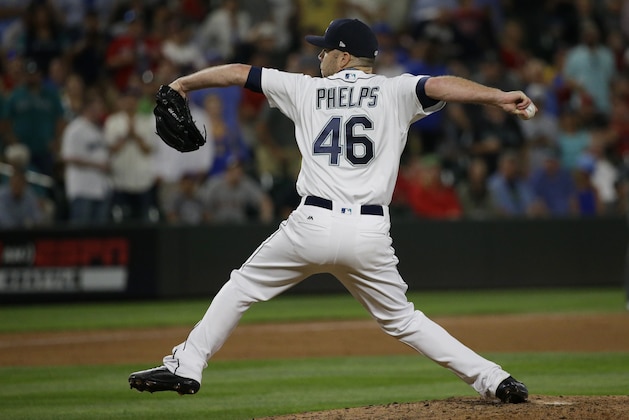 Seattle Mariners closing pitcher David Phelps throws against the Boston Red Sox in the ninth inning of a baseball game, Monday, July 24, 2017, in Seattle. The Mariners won 4-0. (AP Photo/Ted S. Warren)