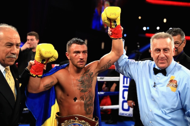 LOS ANGELES, CA - AUGUST 05:  Vasyl Lomachenko of Ukraine reacts after defeating  Miguel Marriaga of Columbia by TKO  in the seventh round  during their WBO World Championship Junior Lightweight title fight at the  Microsoft Theater on August 5, 2017 in Los Angeles, California.  (Photo by Sean M. Haffey/Getty Images)
