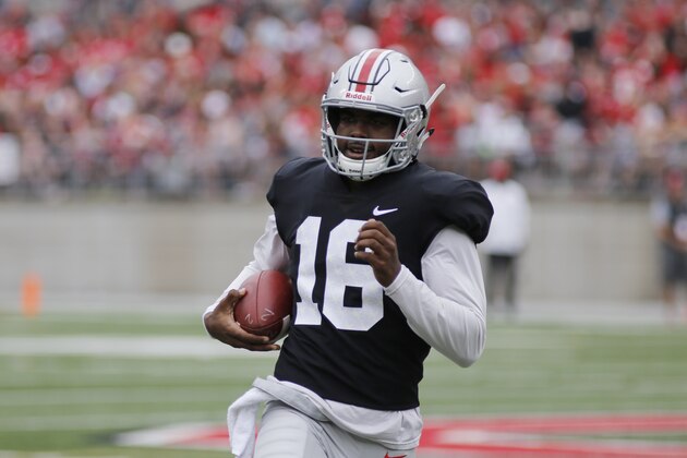 Ohio State quarterback J.T. Barrett plays in their NCAA college spring football game Saturday, April 15, 2017, in Columbus, Ohio. (AP Photo/Jay LaPrete)