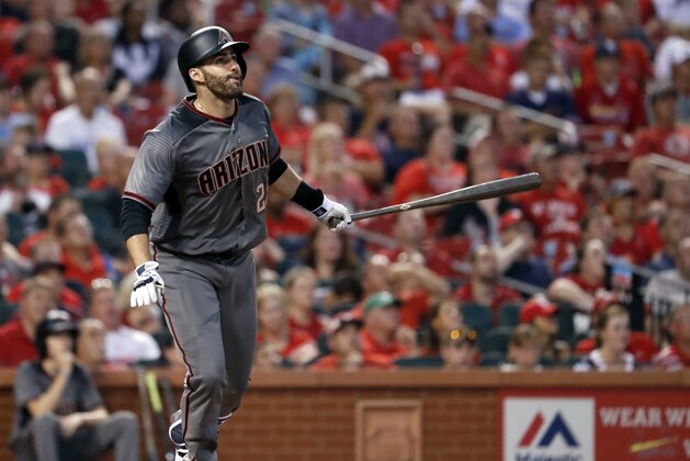 Arizona Diamondbacks' J.D. Martinez watches his grand slam during the fourth inning of the team's baseball game against the St. Louis Cardinals on Thursday, July 27, 2017, in St. Louis. (AP Photo/Jeff Roberson)