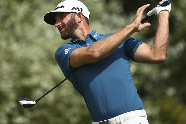 Dustin Johnson of the United States plays off the 5th tee during the third round of the British Open Golf Championship, at Royal Birkdale, Southport, England, Saturday July 22, 2017. (AP Photo/Dave Thompson)