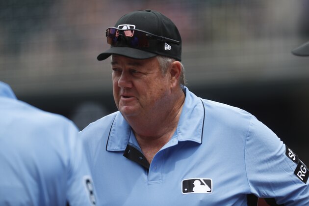 Umpire crew chief Joe West in the first inning of a baseball game Sunday, July 23, 2017, in Denver.(AP Photo/David Zalubowski)
