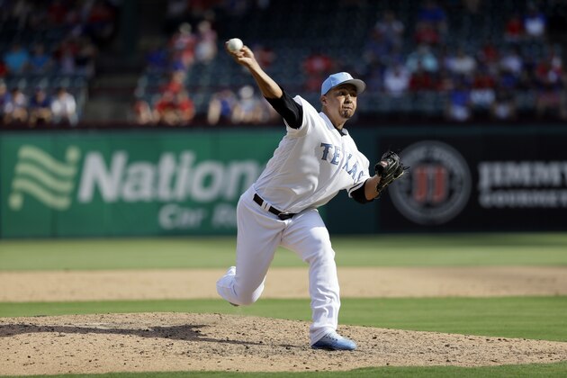 Texas Rangers relief pitcher Ernesto Frieri throws to the Seattle Mariners during a baseball game, Sunday, June 18, 2017, in Arlington, Texas. (AP Photo/Tony Gutierrez)