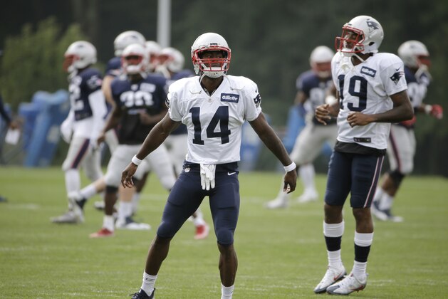 New England Patriots wide receiver Brandin Cooks (14) warms up at NFL football training camp, Thursday, Aug. 3, 2017, in Foxborough, Mass. (AP Photo/Steven Senne)