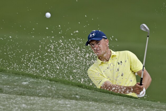 Jordan Spieth hits from a bunker to the 15th green during a practice round at the PGA Championship golf tournament at the Quail Hollow Club Tuesday, Aug. 8, 2017, in Charlotte, N.C. (AP Photo/Chris Carlson)