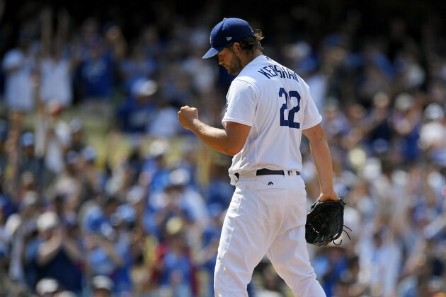 Los Angeles Dodgers starting pitcher Clayton Kershaw celebrates after striking out Kansas City Royals' Alcides Escobar to end a baseball game, Sunday, July 9, 2017, in Los Angeles. (AP Photo/Mark J. Terrill)