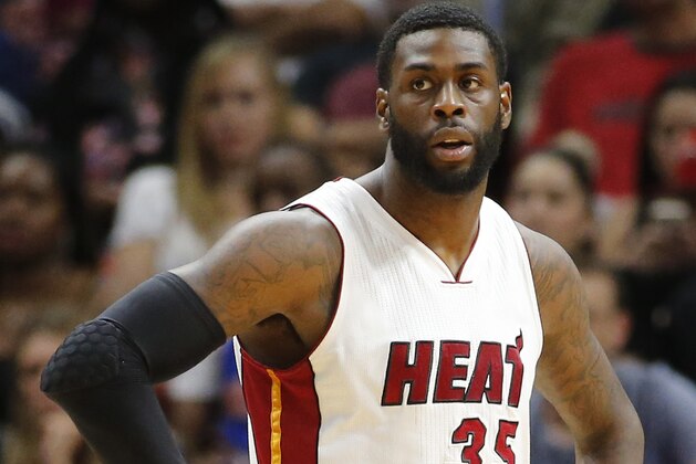 Miami Heat’s Willie Reed (35) looks on during a break in action against the New York Knicks during the first half of an NBA basketball game, Friday, March 31, 2017, in Miami. The Knicks defeated the Heat 98-94. (AP Photo/Joel Auerbach)