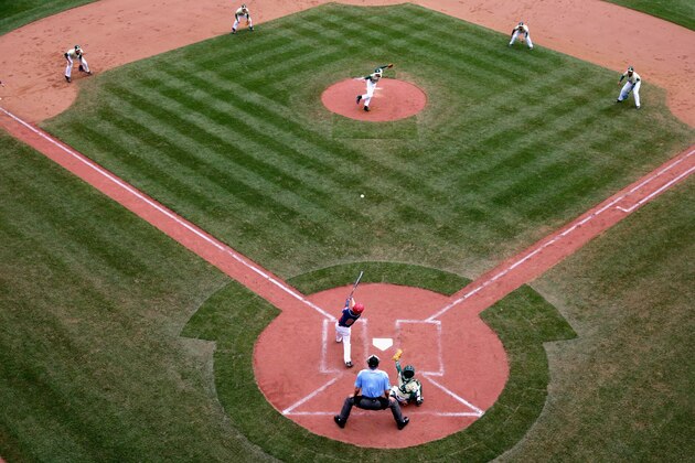 SOUTH WILLIAMSPORT, PA - AUGUST 28:  Conner Rush #8 of Mid-Atlantic Team from New York hits an RBI single in the fourth inning against the Asia-Pacific team from South Korea during the Little League World Series Championship Game at Lamade Stadium on August 28, 2016 in South Williamsport, Pennsylvania.  (Photo by Rob Carr/Getty Images)