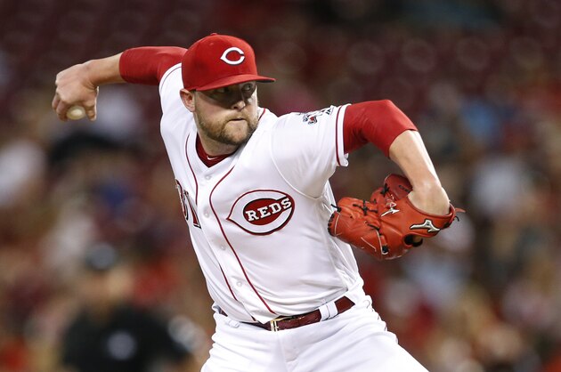Cincinnati Reds relief pitcher Drew Storen throws against the San Diego Padres during the seventh inning of a baseball game, Tuesday, Aug. 8, 2017, in Cincinnati. (AP Photo/Gary Landers)