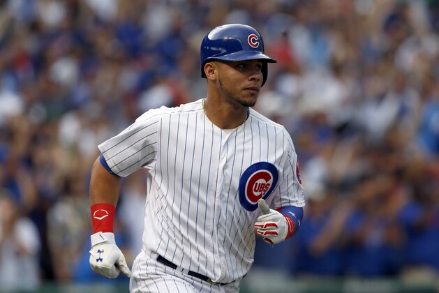 Chicago Cubs' Willson Contreras rounds the bases after hitting a solo home run during the fourth inning of a baseball game against the Washington Nationals, Sunday, Aug. 6, 2017, in Chicago. (AP Photo/Nam Y. Huh)