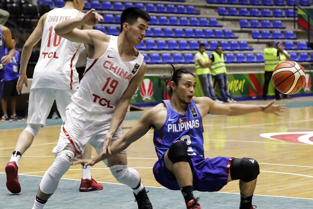 China's basketball player Dehao Yu and Philippines player Romeo Terrence fight for the ball during their FIBA AsiaCup 2017 group match, in the Lebanese town of Zouk Mikael north of Beirut on August 9, 2017.
Phillippines won over China 96 to 87. / AFP PHOTO / JOSEPH EID        (Photo credit should read JOSEPH EID/AFP/Getty Images)