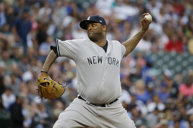 New York Yankees starting pitcher CC Sabathia throws to a Seattle Mariners batter during the first inning of a baseball game, Friday, July 21, 2017, in Seattle. (AP Photo/Ted S. Warren)