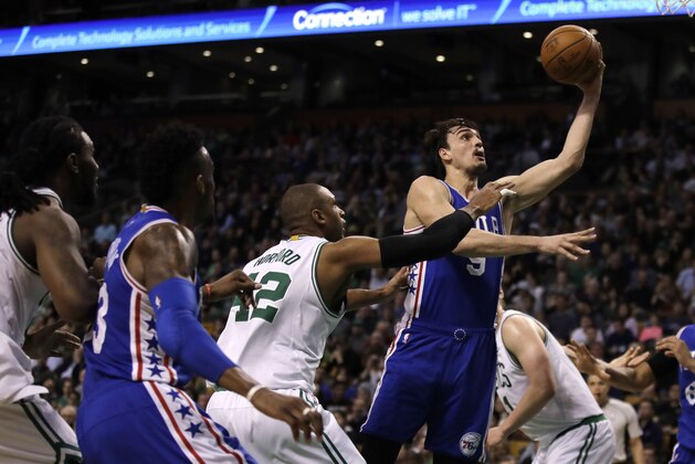 Philadelphia 76ers forward Dario Saric (9) shoots during the second half of an NBA basketball game in Boston, Wednesday, Feb. 15, 2017. The Celtics defeated the 76ers 116-108. (AP Photo/Charles Krupa) Philadelphia 76ers forward Dario Saric (9) shoots during the second half of an NBA basketball game in Boston, Wednesday, Feb. 15, 2017. The Celtics defeated the 76ers 116-108. (AP Photo/Charles Krupa)