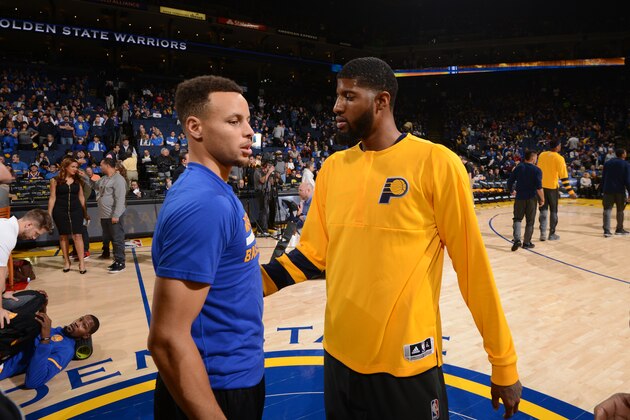 OAKLAND, CA - DECEMBER 5:  Stephen Curry #30 of the Golden State Warriors and Paul George #13 of the Indiana Pacers before the game against the Indiana Pacers on December 5, 2016 at ORACLE Arena in Oakland, California. NOTE TO USER: User expressly acknowledges and agrees that, by downloading and or using this photograph, user is consenting to the terms and conditions of Getty Images License Agreement. Mandatory Copyright Notice: Copyright 2016 NBAE (Photo by Noah Graham/NBAE via Getty Images)
