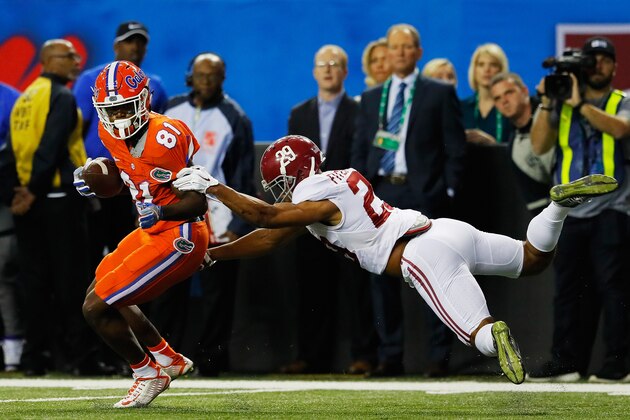ATLANTA, GA - DECEMBER 03:  Antonio Callaway #81 of the Florida Gators breaks the takle of Minkah Fitzpatrick #29 of the Alabama Crimson Tide in the first quarter during the SEC Championship game at the Georgia Dome on December 3, 2016 in Atlanta, Georgia.  (Photo by Kevin C. Cox/Getty Images)