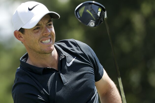 Rory McIlroy of Northern Ireland, watches his tee shot on the third hole during the first round of the PGA Championship golf tournament at the Quail Hollow Club Thursday, Aug. 10, 2017, in Charlotte, N.C. (AP Photo/Chuck Burton)