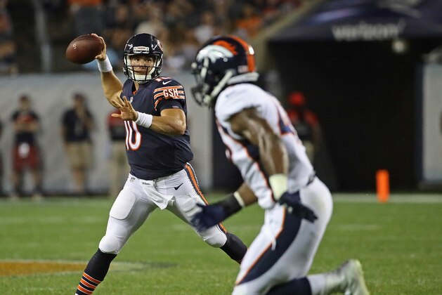 CHICAGO, IL - AUGUST 10:  Mitchell Trubisky #10 of the Chicago Bears passes as Quentin Gause #49 of the Denver Broncos gives chase during a preseason game at Soldier Field on August 10, 2017 in Chicago, Illinois. The Broncos defeated the Bears 24-17.  (Photo by Jonathan Daniel/Getty Images)