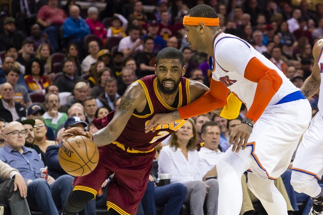 CLEVELAND, OH - FEBRUARY 23: Kyrie Irving #2 of the Cleveland Cavaliers drives around Carmelo Anthony #7 of the New York Knicks during the second half at Quicken Loans Arena on February 23, 2017 in Cleveland, Ohio. The Cavaliers defeated the Knicks 119-104. NOTE TO USER: User expressly acknowledges and agrees that, by downloading and/or using this photograph, user is consenting to the terms and conditions of the Getty Images License Agreement. (Photo by Jason Miller/Getty Images)