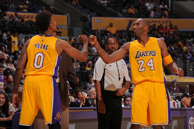 LOS ANGELES, CA - OCTOBER 11:  Nick Young #0 and Kobe Bryant #24 of the Los Angeles Lakers shake hands against Maccabi Haifa during the preseason game on October 11, 2015 at STAPLES CENTER in Los Angeles, California. NOTE TO USER: User expressly acknowledges and agrees that, by downloading and or using this Photograph, user is consenting to the terms and conditions of the Getty Images License Agreement. Mandatory Copyright Notice: Copyright 2015 NBAE (Photo by Juan Ocampo/NBAE via Getty Images)