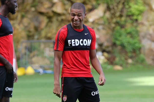 Monaco L1 football club's forward Kylian Mbappe Lottin takes part in a training session on August 11, 2017 in La Turbie, near Monaco.   / AFP PHOTO / VALERY HACHE        (Photo credit should read VALERY HACHE/AFP/Getty Images)
