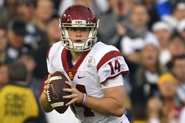 FILE - In this Monday, Jan. 2, 2017, file photo, Southern California quarterback Sam Darnold looks to pass during the first half of the Rose Bowl NCAA college football game against Penn State in Pasadena, Calif. Darnold was selected to the Associated Press 2016 All-Bowl Team, announced on Wednesday, Jan. 4, 2017. (AP Photo/Mark J. Terrill)