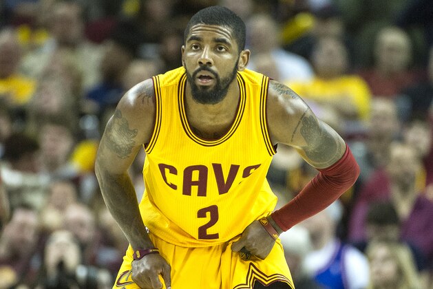 Cleveland Cavaliers' Kyrie Irving (2) waits for the Washington Wizards to bring the ball upcourt during the first half of an NBA basketball game in Cleveland, Saturday, March 25, 2017. (AP Photo/Phil Long)