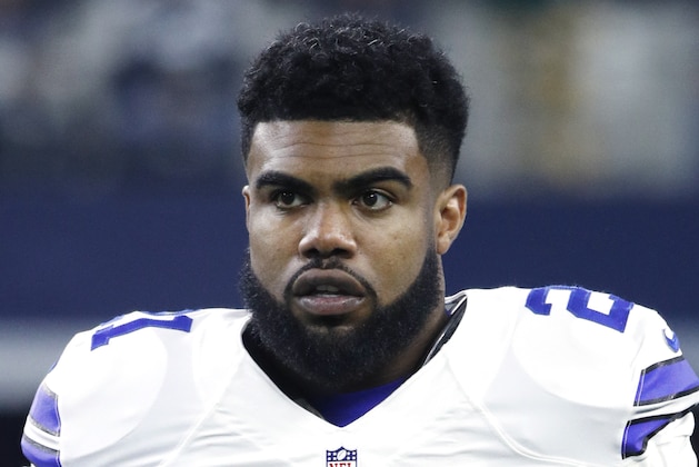 ARLINGTON, TX - JANUARY 15: Ezekiel Elliott #21 of the Dallas Cowboys looks on before the NFC Divisional Playoff game against the Green Bay Packers at AT&T Stadium on January 15, 2017 in Arlington, Texas. The Packers defeated the Cowboys 34-31. (Photo by Joe Robbins/Getty Images)