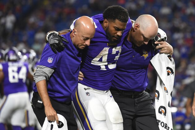 Minnesota Vikings running back Bishop Sankey (43) is helped off the field after being injured during the second half of a preseason NFL football game against the Buffalo Bills Thursday, Aug. 10, 2017, in Orchard Park, N.Y. (AP Photo/Rich Barnes)