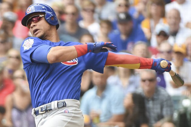 Jul 30, 2017; Milwaukee, WI, USA; Chicago Cubs catcher Willson Contreras (40) drives in a run with an infield hit in the sixth inning during the game against the Milwaukee Brewers at Miller Park. Mandatory Credit: Benny Sieu-USA TODAY Sports Jul 30, 2017; Milwaukee, WI, USA; Chicago Cubs catcher Willson Contreras (40) drives in a run with an infield hit in the sixth inning during the game against the Milwaukee Brewers at Miller Park. Mandatory Credit: Benny Sieu-USA TODAY Sports