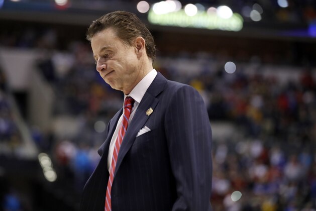 Louisville head coach Rick Pitino walks off the court after a 73-69 loss to Michigan in a second-round game in the men's NCAA college basketball tournament Sunday, March 19, 2017, in Indianapolis. (AP Photo/Jeff Roberson)