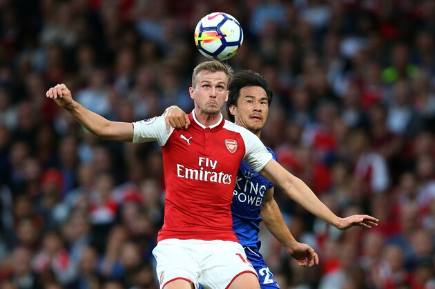 LONDON, ENGLAND - AUGUST 11:  Rob Holding of Arsenal and Shinji Okazaki of Leicester City during the Premier League match between Arsenal and Leicester City at Emirates Stadium on August 11, 2017 in London, England. (Photo by Catherine Ivill - AMA/Getty Images)