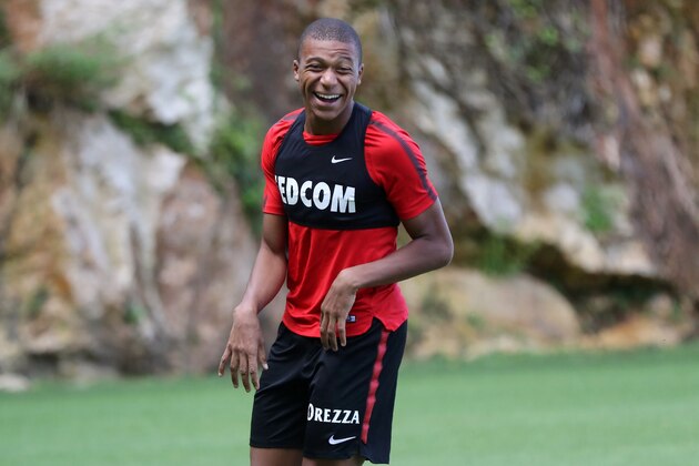 Monaco L1 football club's forward Kylian Mbappe Lottin takes part in a training session on August 11, 2017 in La Turbie, near Monaco.   / AFP PHOTO / VALERY HACHE        (Photo credit should read VALERY HACHE/AFP/Getty Images)