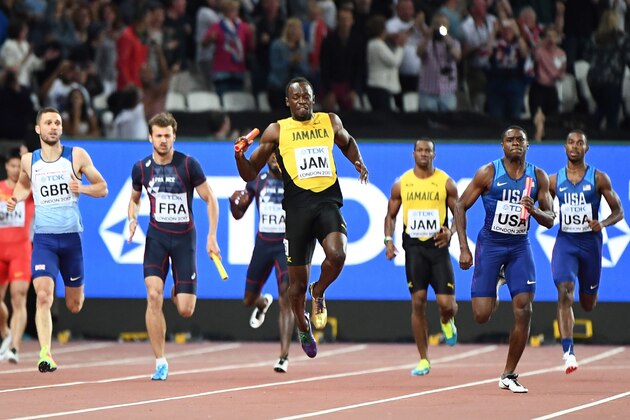 Jamaica's Usain Bolt (C) falls on Jamaica's anchor leg of the final of the men's 4x100m relay athletics event at the 2017 IAAF World Championships at the London Stadium in London on August 12, 2017. / AFP PHOTO / Jewel SAMAD (Photo credit should read JEWEL SAMAD/AFP/Getty Images) Jamaica's Usain Bolt (C) falls on Jamaica's anchor leg of the final of the men's 4x100m relay athletics event at the 2017 IAAF World Championships at the London Stadium in London on August 12, 2017. / AFP PHOTO / Jewel SAMAD (Photo credit should read JEWEL SAMAD/AFP/Getty Images)