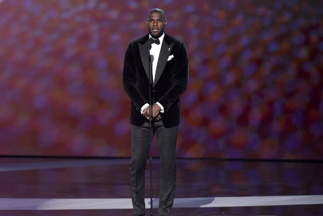 LeBron James presents the Jimmy V award for perseverance at the ESPY Awards at the Microsoft Theater on Wednesday, July 15, 2015, in Los Angeles. (Photo by Chris Pizzello/Invision/AP)